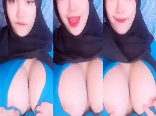 Bokep Jilbab Pamer Dada Montok Tanpa BH Sange backdrop